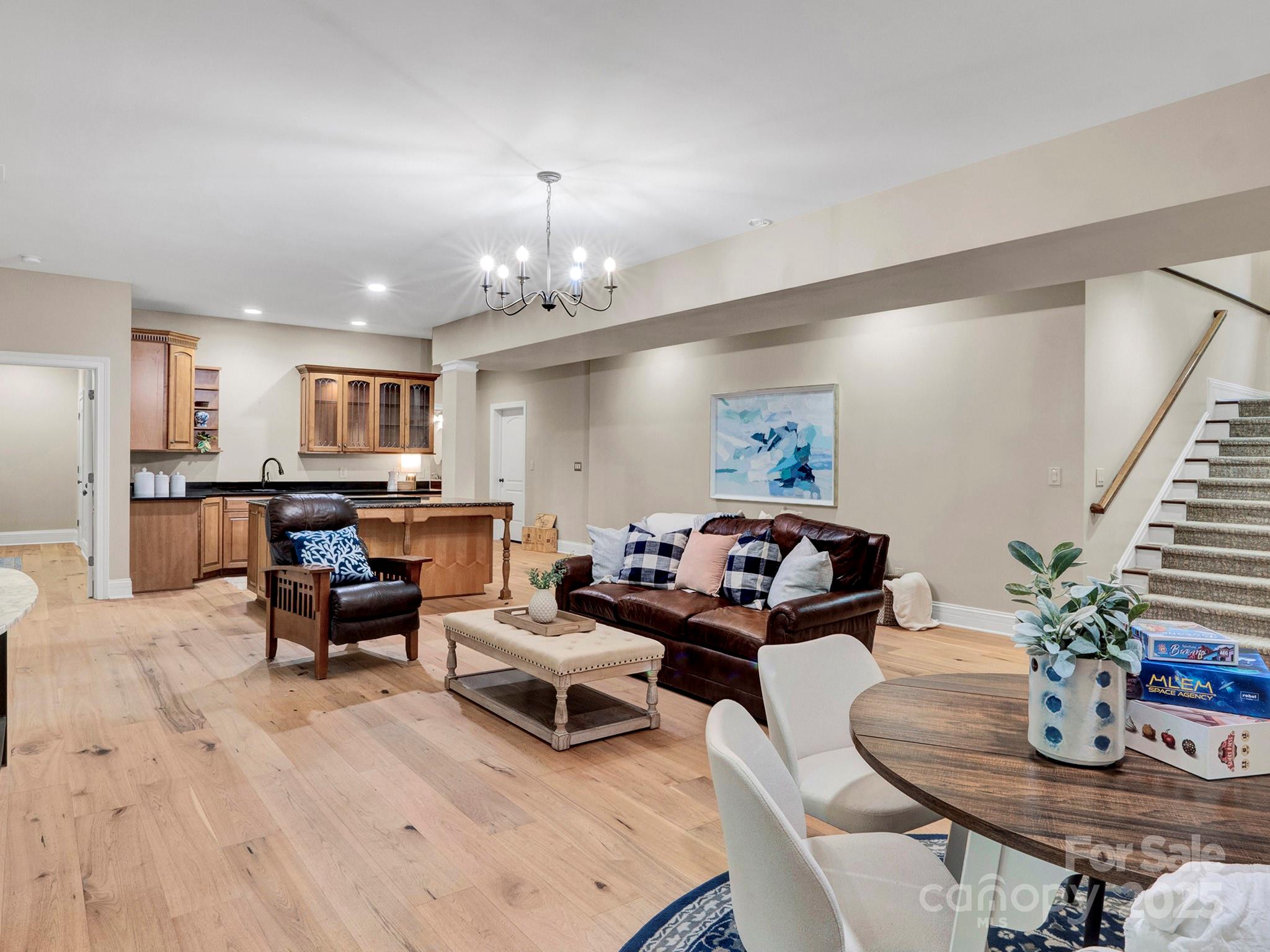 225 Riverton Road Weddington, NC 28104 - Photo 24 of 41 a living room with furniture and kitchen view