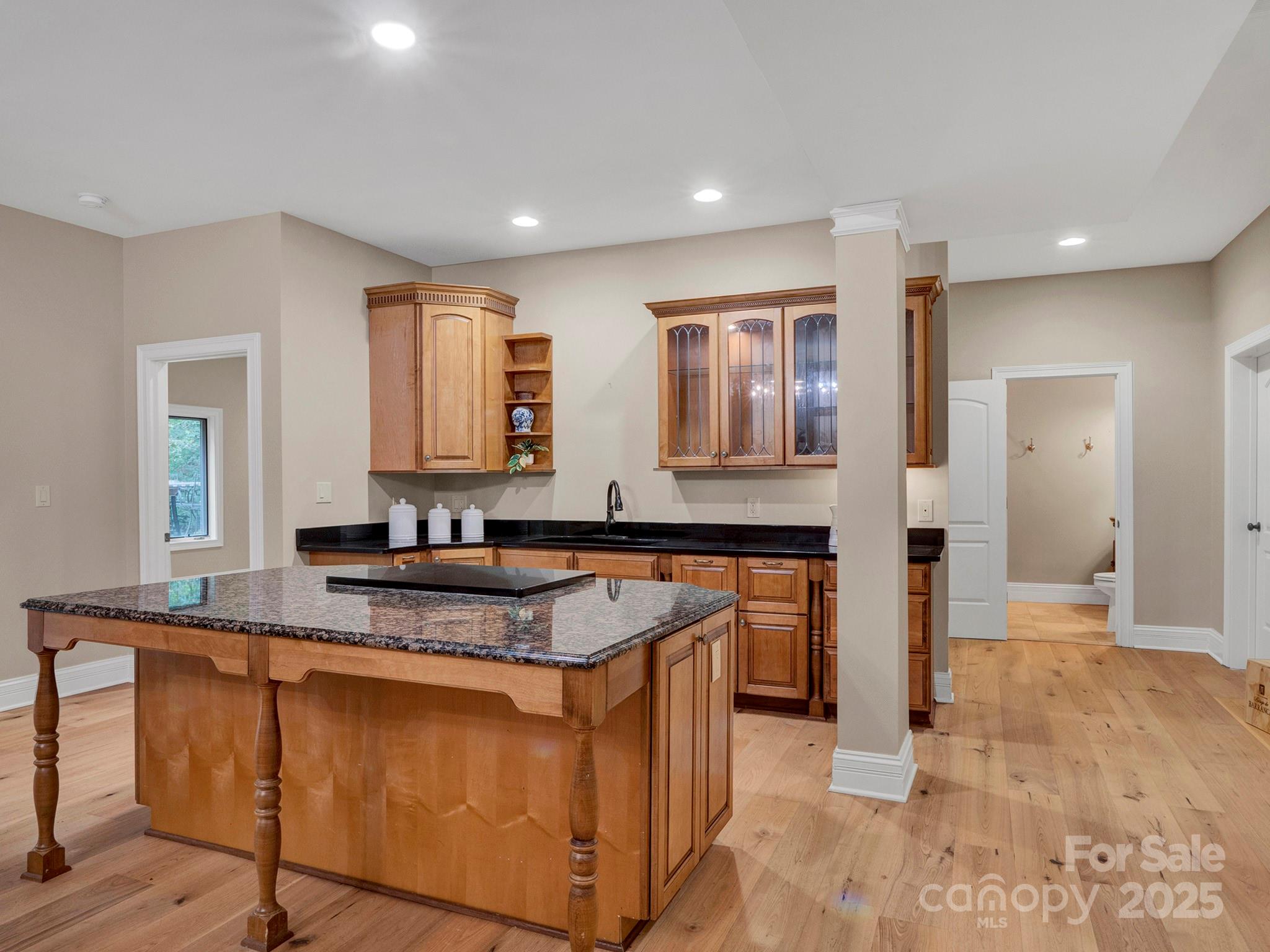 225 Riverton Road Weddington, NC 28104 - Photo 25 of 41 a kitchen with stainless steel appliances granite countertop a stove a sink and a refrigerator