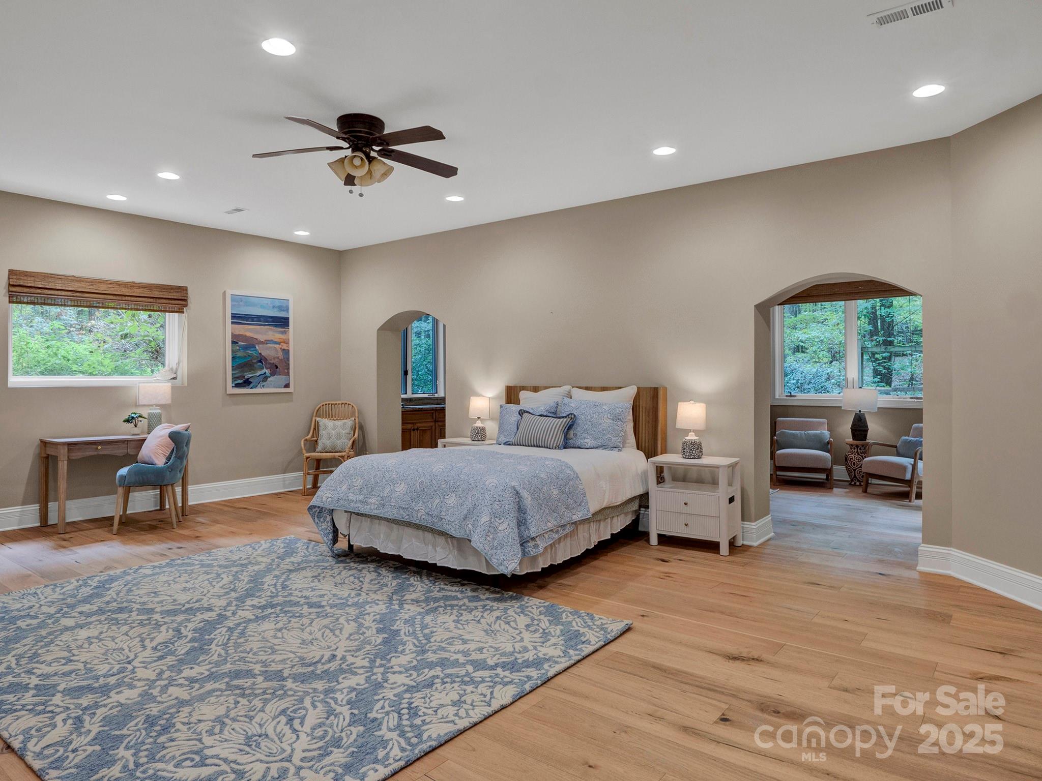225 Riverton Road Weddington, NC 28104 - Photo 27 of 41 a bedroom with a bed and a large window