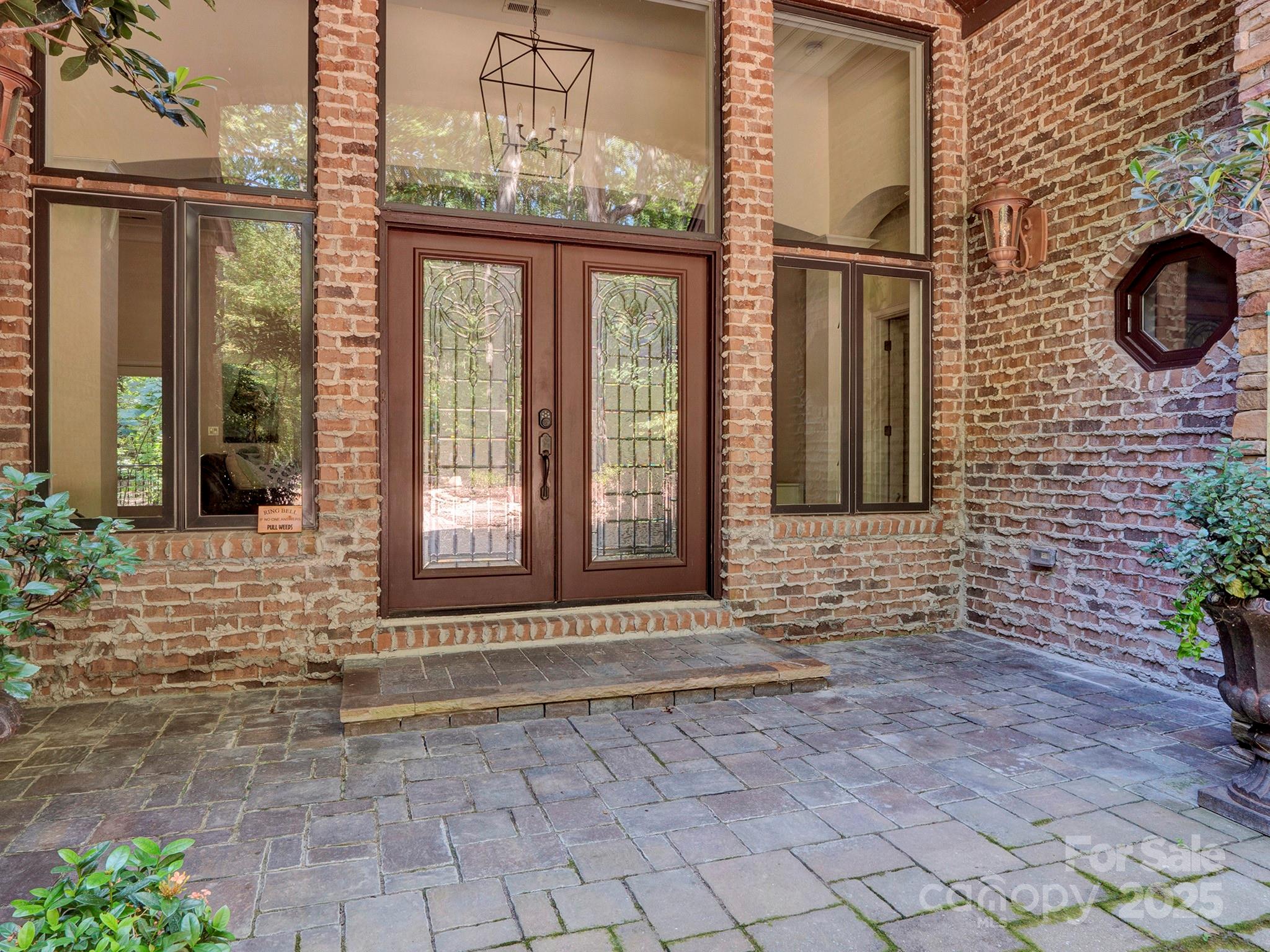 225 Riverton Road Weddington, NC 28104 - Photo 3 of 41 a front view of a house with a gate