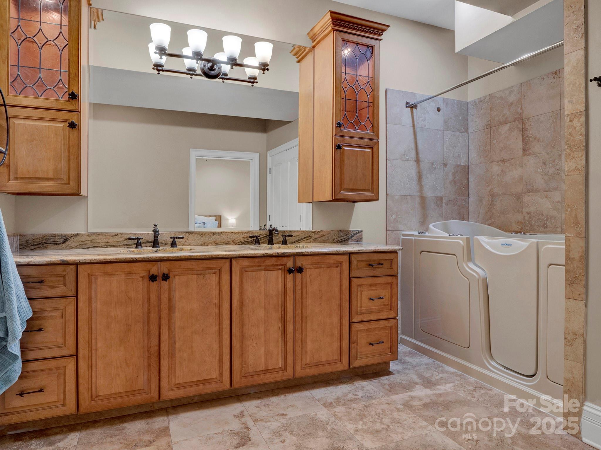 225 Riverton Road Weddington, NC 28104 - Photo 31 of 41 a bathroom with a sink and a mirror