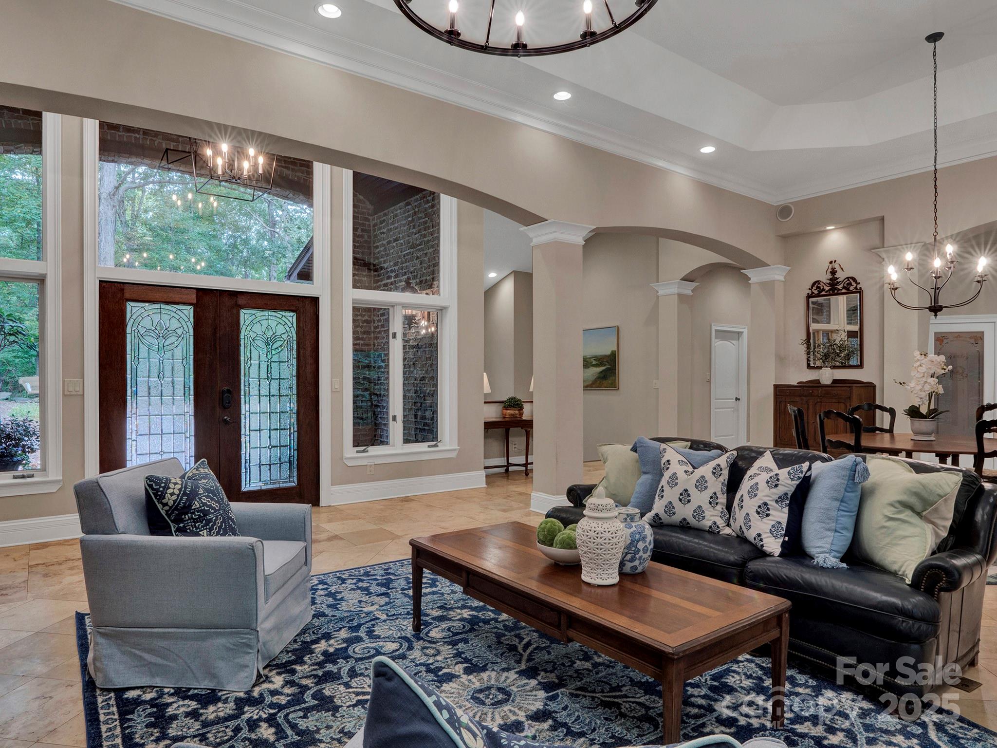 225 Riverton Road Weddington, NC 28104 - Photo 4 of 41 a living room with furniture and a large window