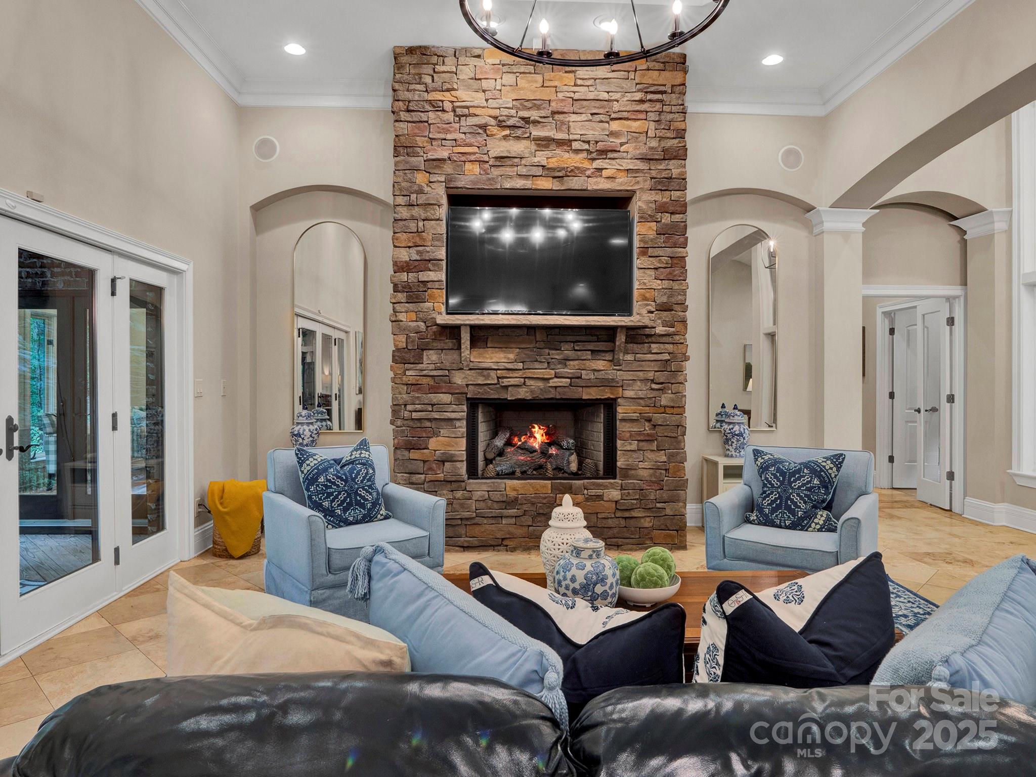 225 Riverton Road Weddington, NC 28104 - Photo 5 of 41 a living room with furniture and a fireplace