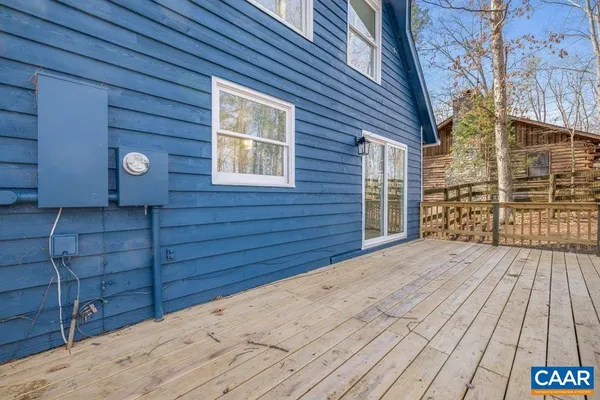 a view of a house with backyard of the house
