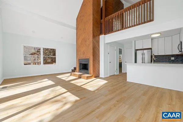 a view of a kitchen with kitchen and living room