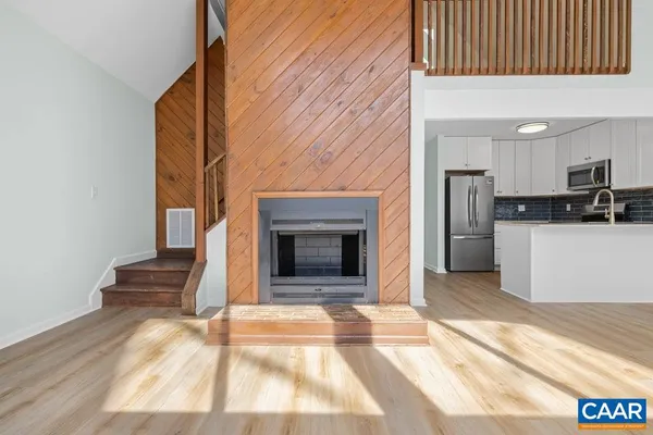 a view of a livingroom with a fireplace