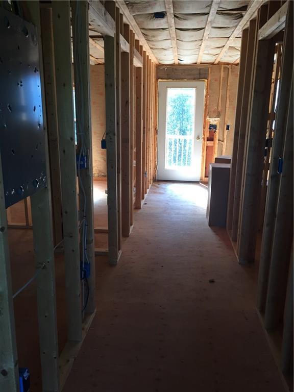 1063 Meadow Pond Road Islesboro, ME 04848 - Photo 13 of 20 hallway from the front of the unit...