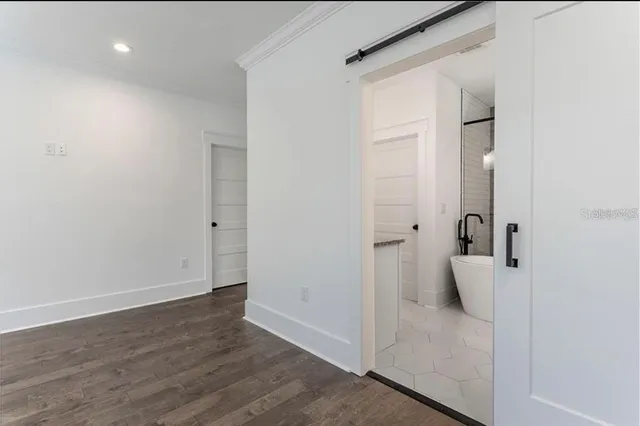 a white bath tub sitting in a bathroom