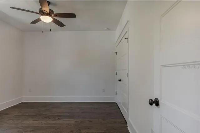a bathroom with sink granite and mirror