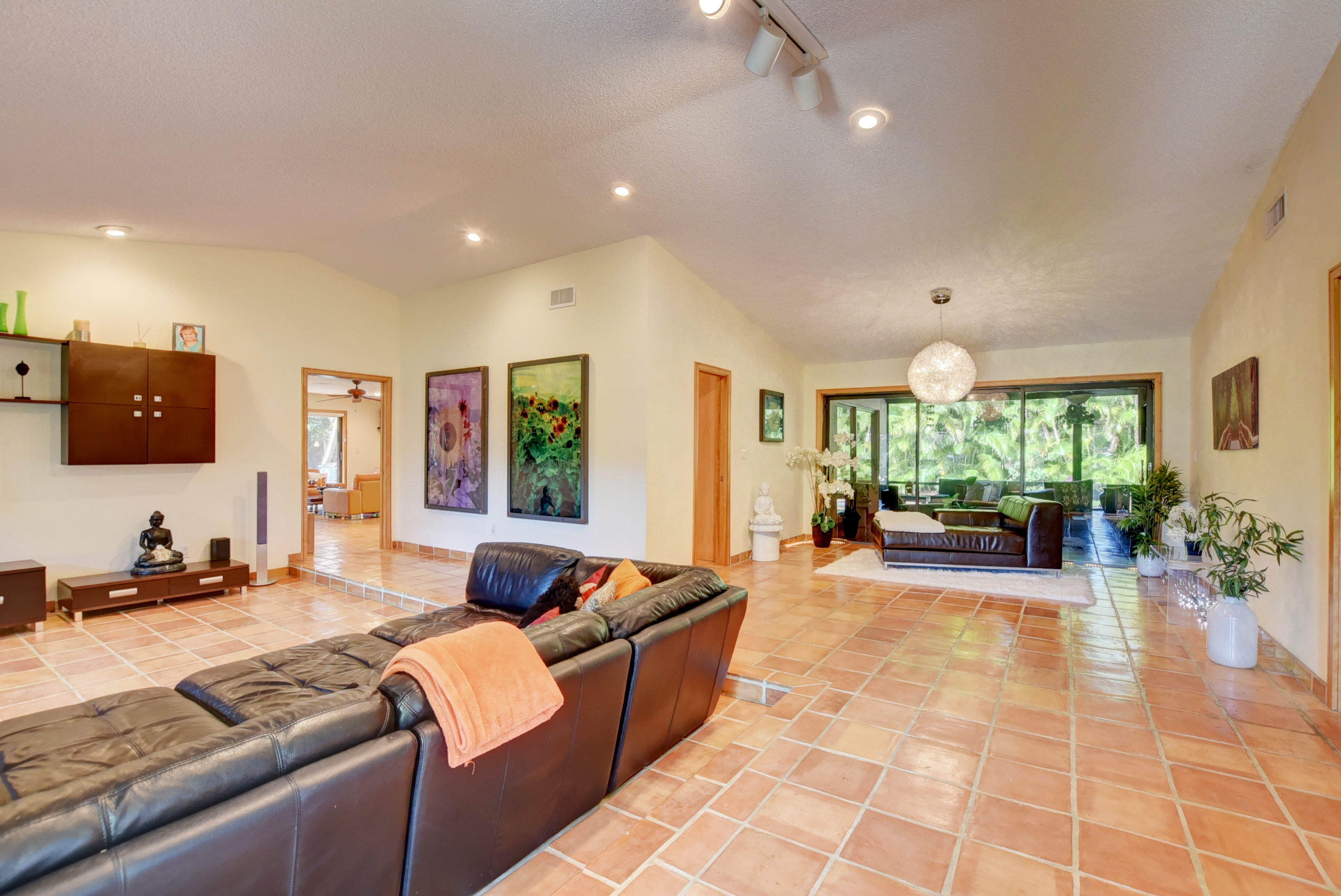 6761 Entrada Place Boca Raton, FL 33433 - Photo 12 of 69 a living room with furniture and a flat screen tv