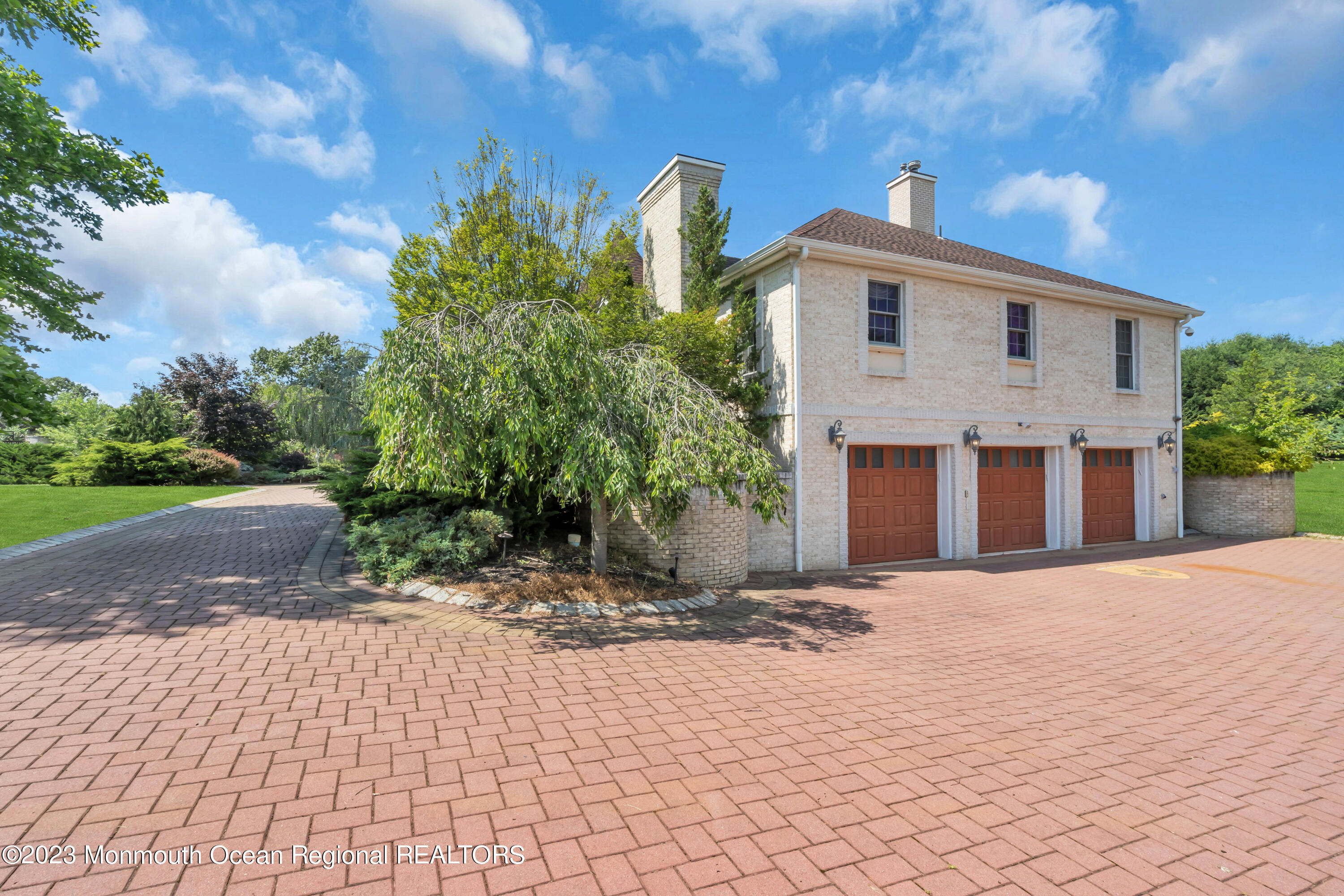 2 Bluebell Road Colts Neck, NJ 07722 - Photo 68 of 80 a front view of a house with a yard