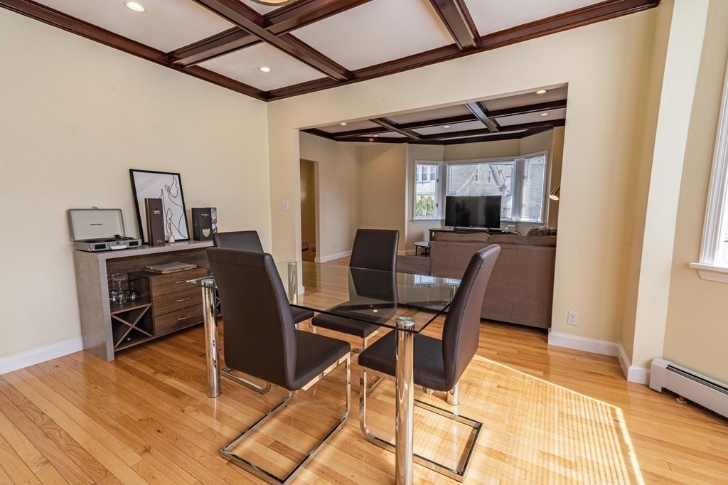 12 Jones Avenue, Unit 1 Chelsea, MA 02150 - Photo 5 of 17 a workspace with furniture and wooden floor