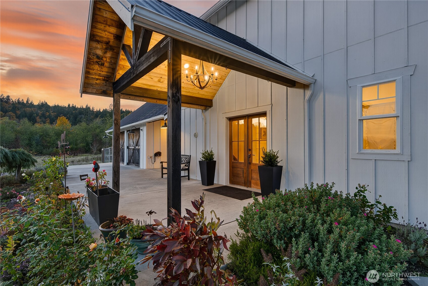 a front view of house and yard with seating space