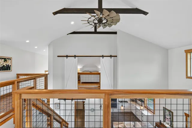 a bed room with a bed and a potted plant