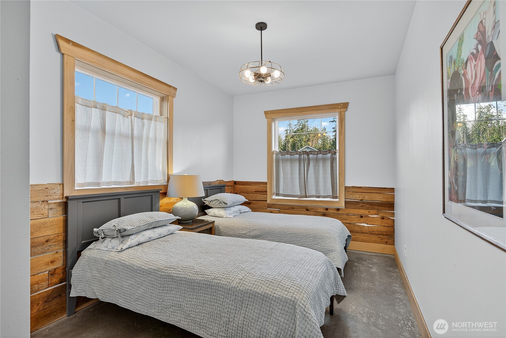 157 Russell Road Camano Island, WA 98282 - Photo 24 of 38 a bedroom with bed and a window