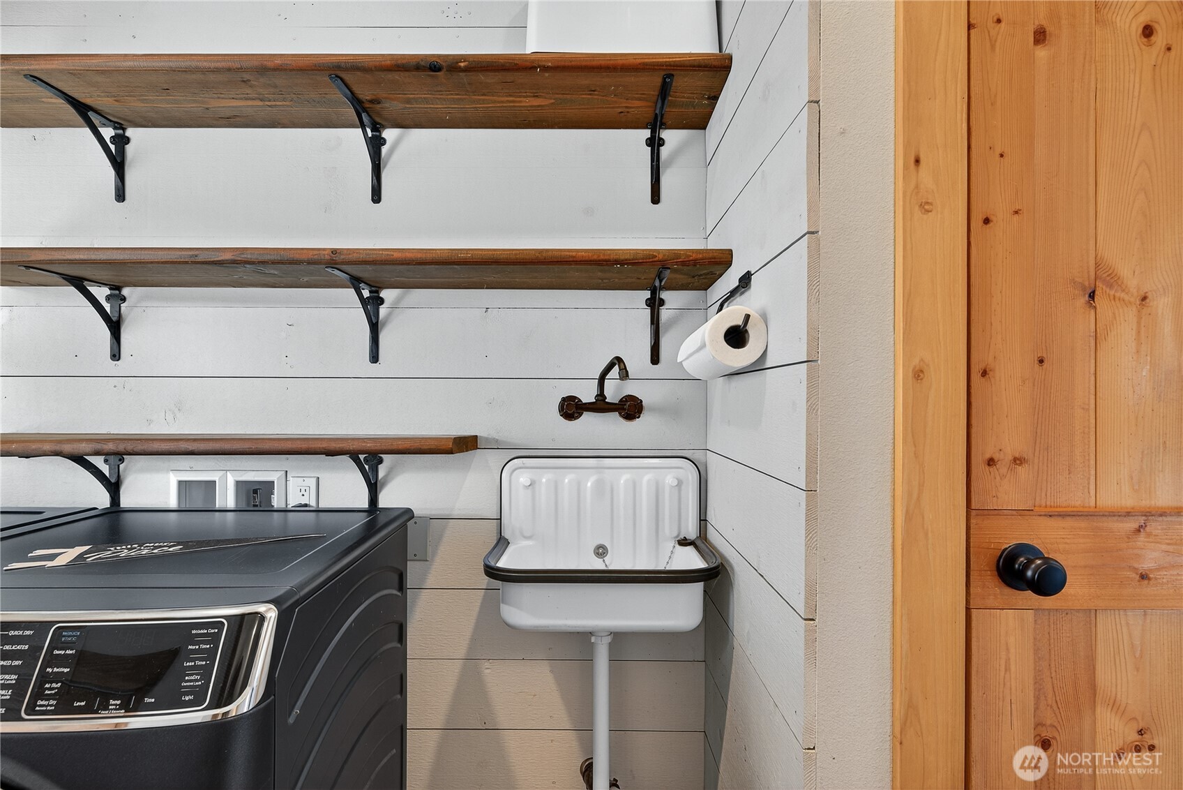 157 Russell Road Camano Island, WA 98282 - Photo 29 of 38 a bathroom with a sink and a mirror