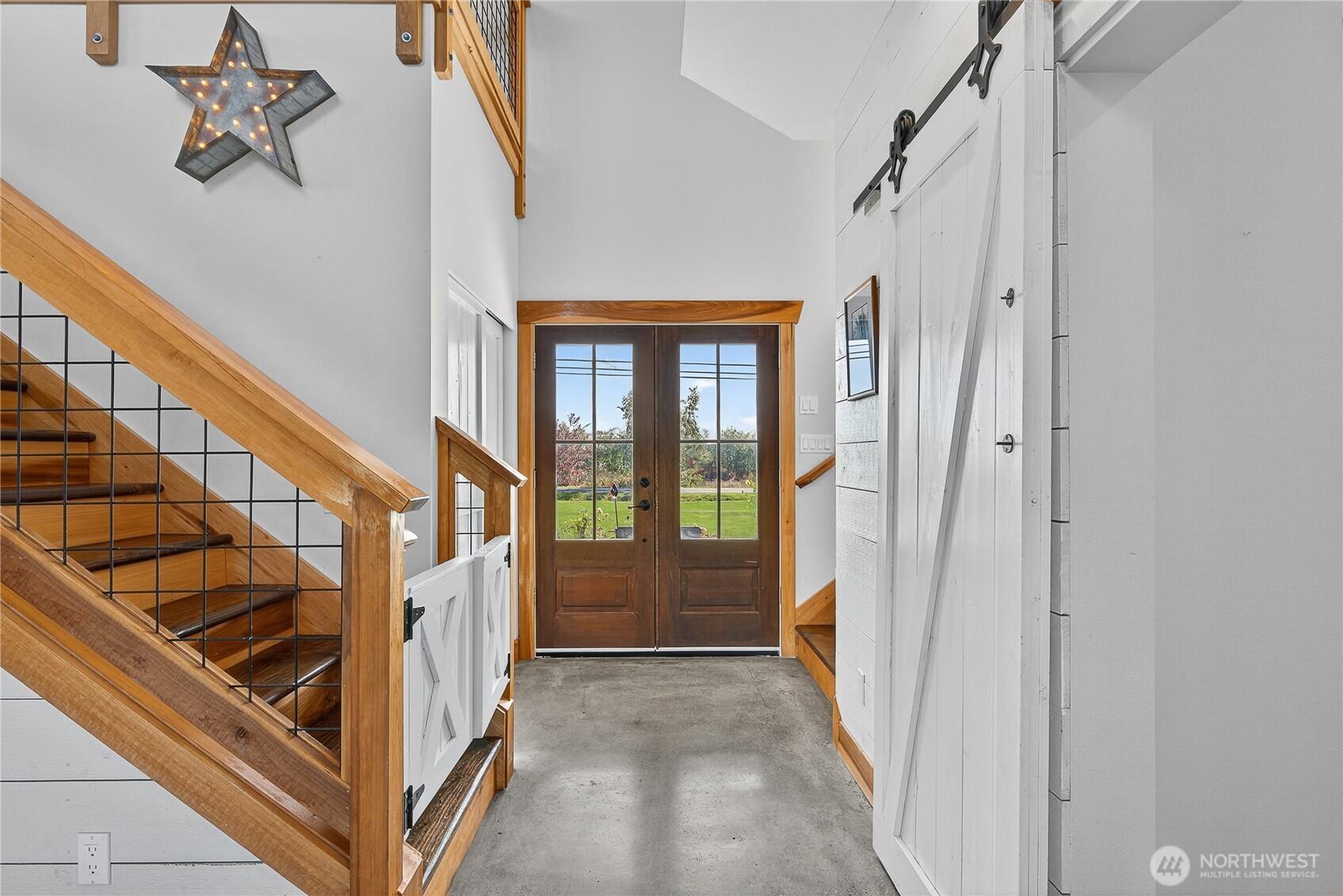 157 Russell Road Camano Island, WA 98282 - Photo 5 of 38 a view of an entryway with staircase