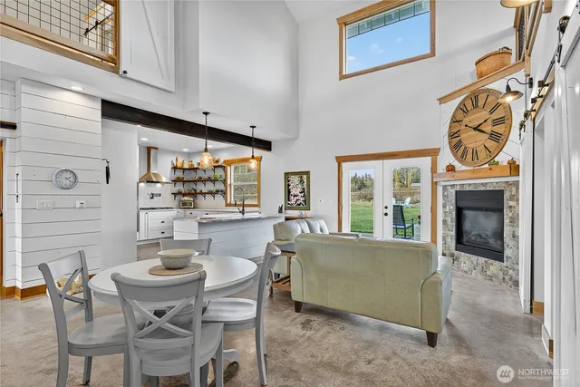 a view of a dining room with furniture window and outside view
