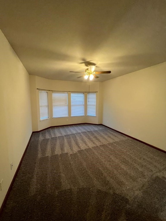 411 Stream Mill Lane Katy, TX 77494 - Photo 15 of 29 an empty room with a empty space and window