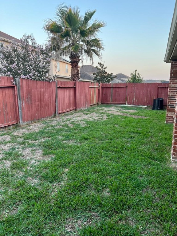 411 Stream Mill Lane Katy, TX 77494 - Photo 20 of 29 a view of backyard with wooden fence