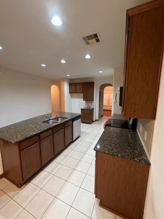 411 Stream Mill Lane Katy, TX 77494 - Photo 25 of 29 a kitchen with granite countertop sink and a granite counter top