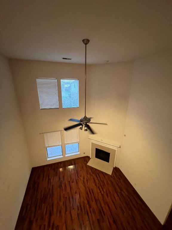 411 Stream Mill Lane Katy, TX 77494 - Photo 27 of 29 a view of a room with wooden floor and a ceiling fan