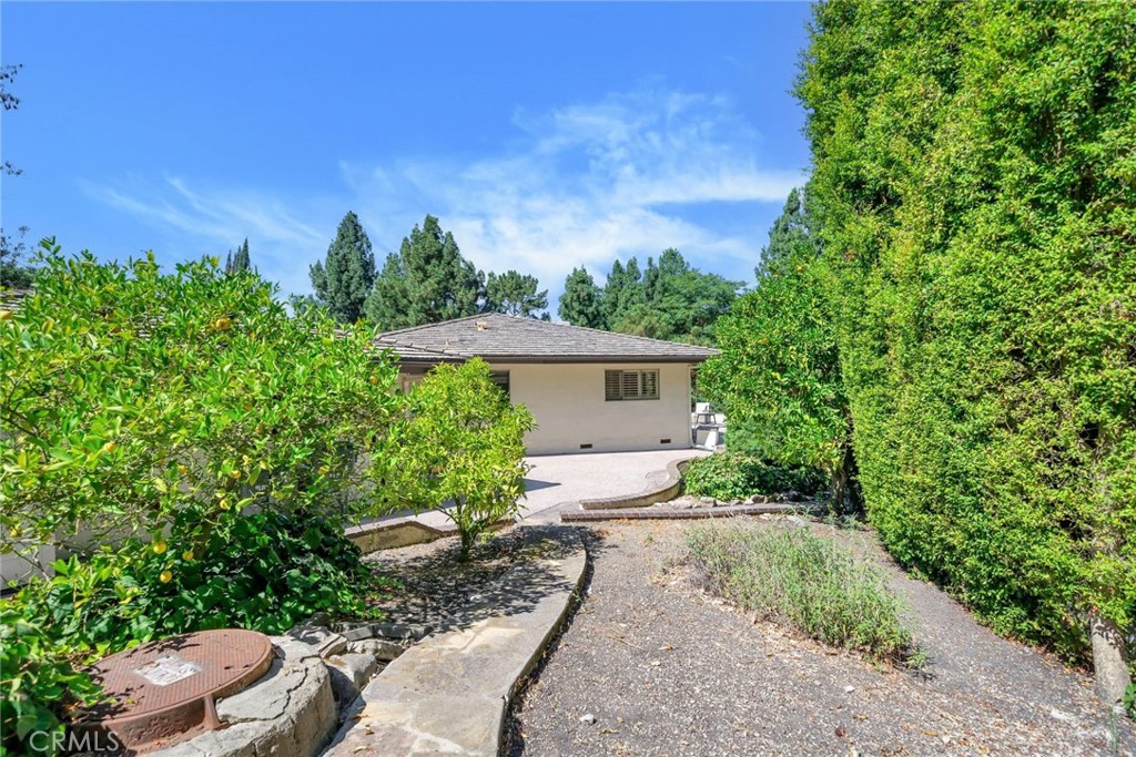 5203 Middlecrest Road Rancho Palos Verdes, CA 90275 - Photo 14 of 28 a front view of a house with a yard