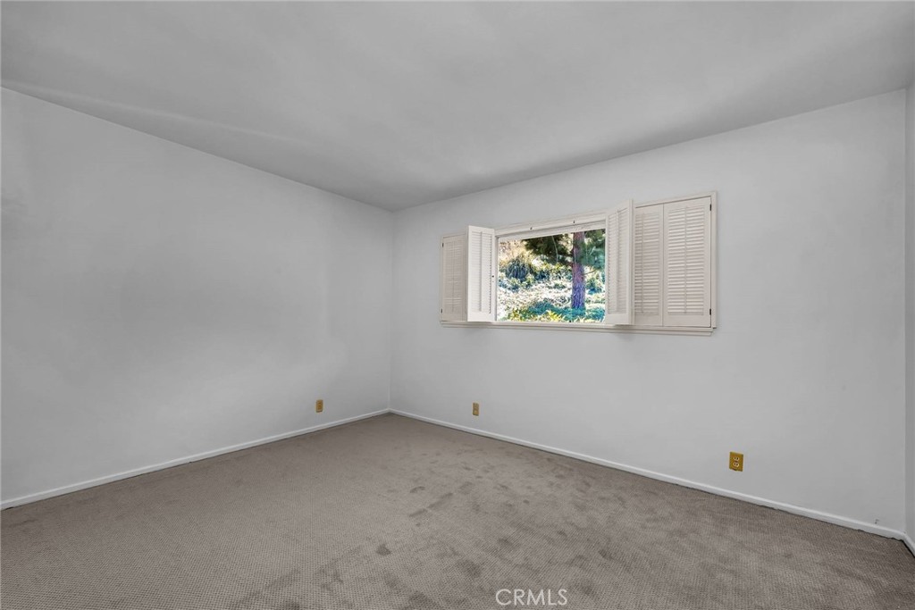 5203 Middlecrest Road Rancho Palos Verdes, CA 90275 - Photo 18 of 28 an empty room with windows