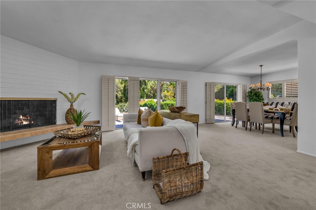 5203 Middlecrest Road Rancho Palos Verdes, CA 90275 - Photo 2 of 28 a living room with furniture and a fireplace