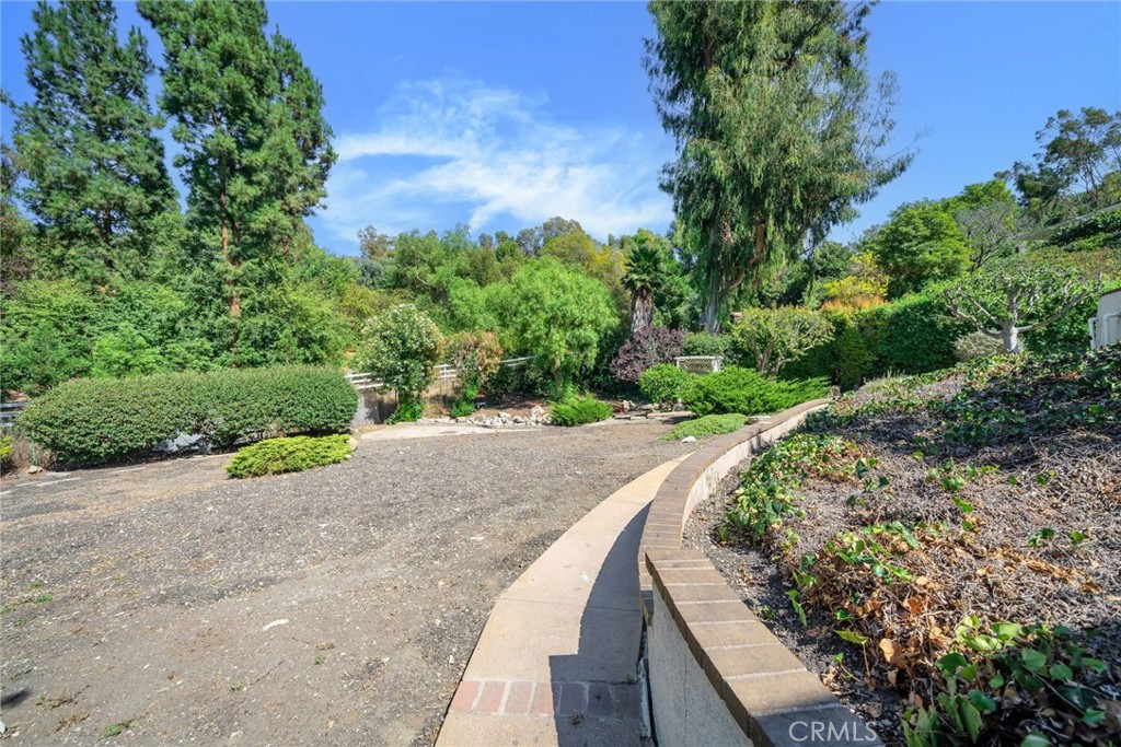 5203 Middlecrest Road Rancho Palos Verdes, CA 90275 - Photo 26 of 28 a view of a road with a yard