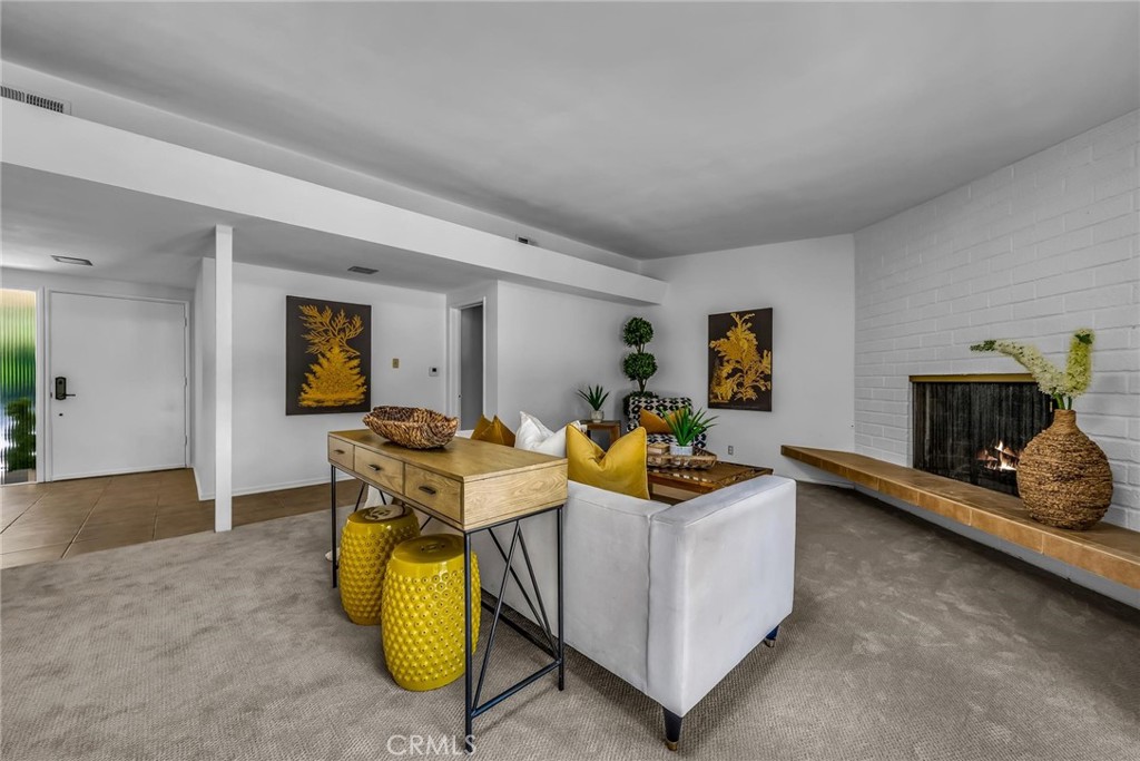 5203 Middlecrest Road Rancho Palos Verdes, CA 90275 - Photo 4 of 28 a living room with furniture and a fireplace