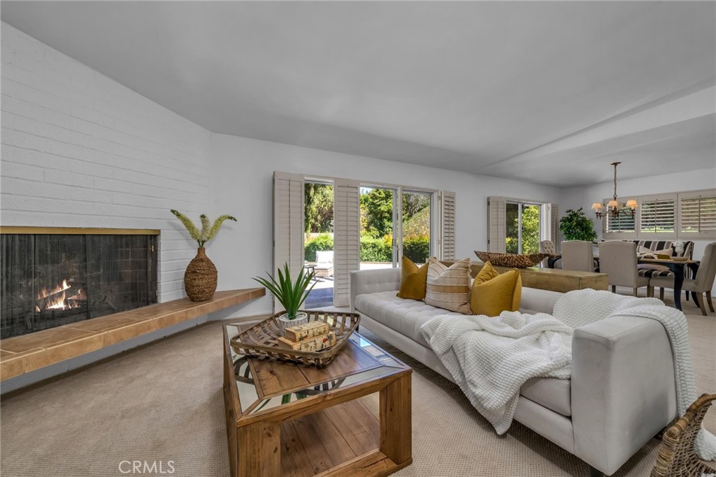 5203 Middlecrest Road Rancho Palos Verdes, CA 90275 - Photo 6 of 28 a living room with furniture and a fireplace