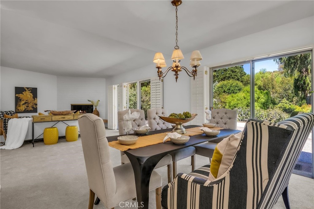 5203 Middlecrest Road Rancho Palos Verdes, CA 90275 - Photo 7 of 28 a view of a dining room with furniture window and outside view