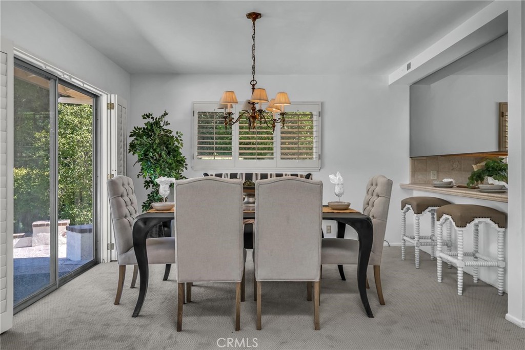 5203 Middlecrest Road Rancho Palos Verdes, CA 90275 - Photo 8 of 28 a view of a dining room with furniture window and outside view