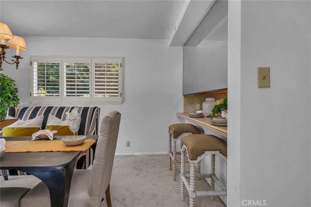 5203 Middlecrest Road Rancho Palos Verdes, CA 90275 - Photo 9 of 28 a view of a dining room with furniture window and outside view