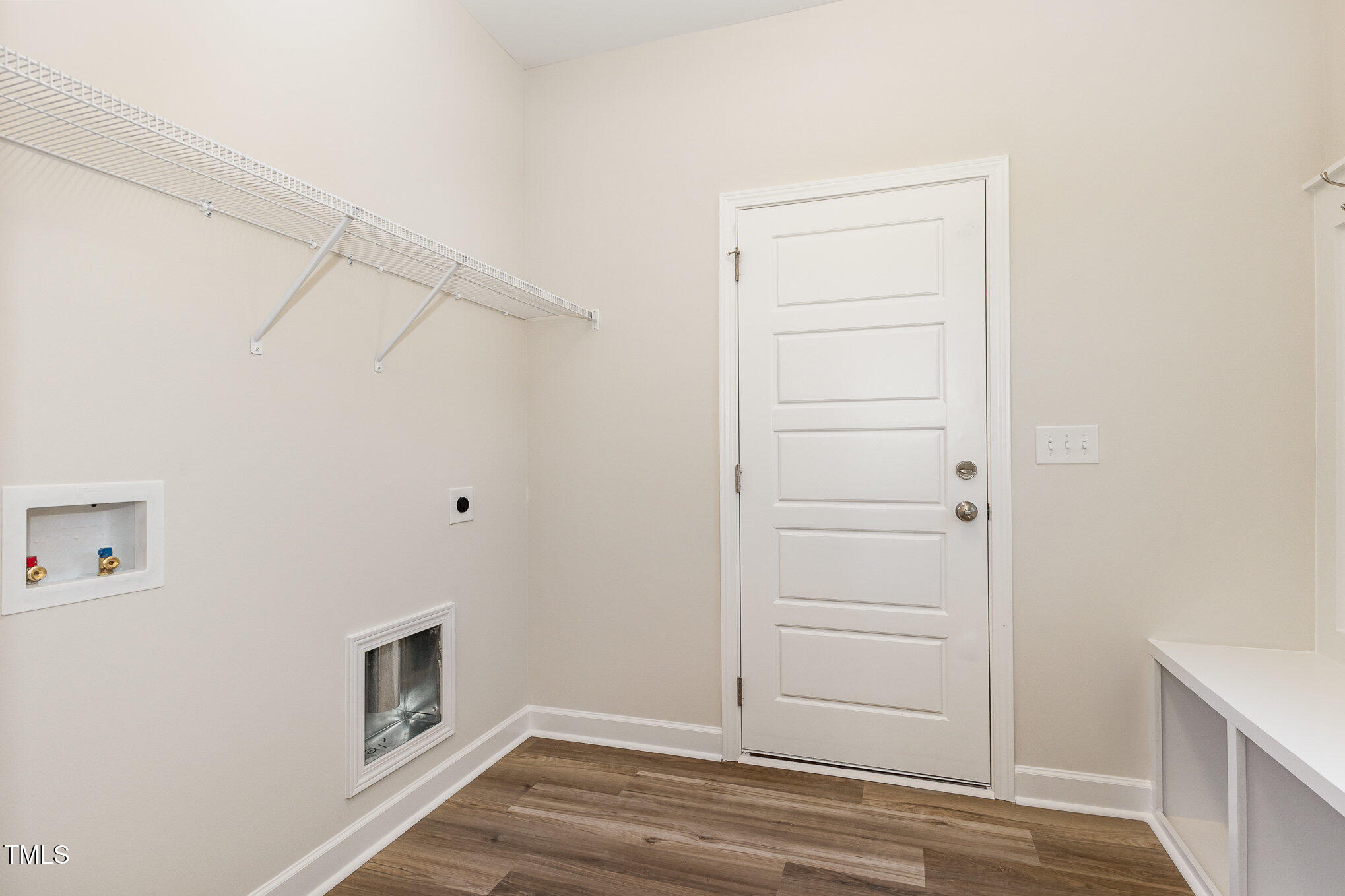15 Barony Lane Smithfield, NC 27577 - Photo 12 of 24 a view of storage and utility room with empty racks