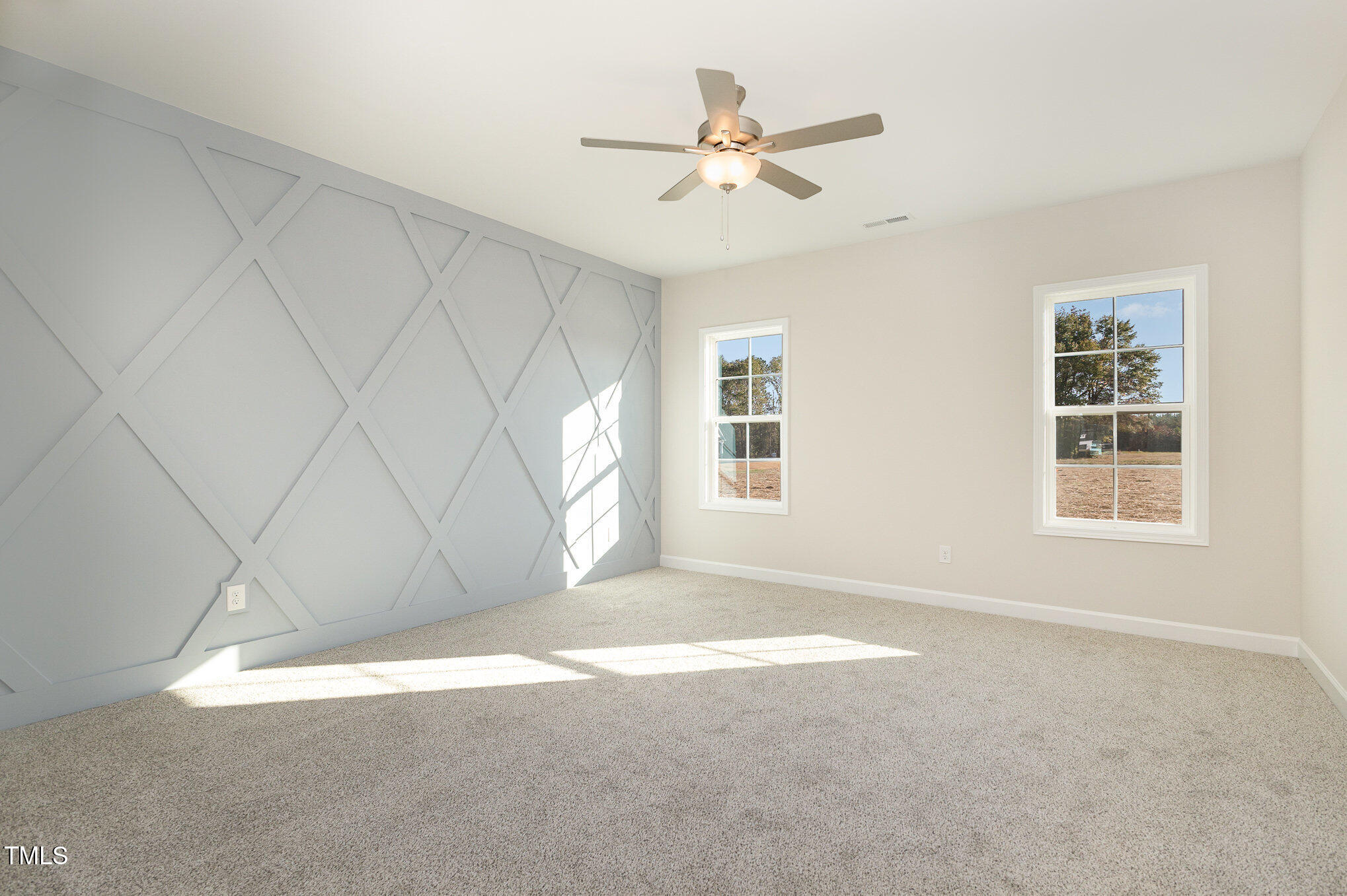 15 Barony Lane Smithfield, NC 27577 - Photo 13 of 24 an empty room with windows and fan