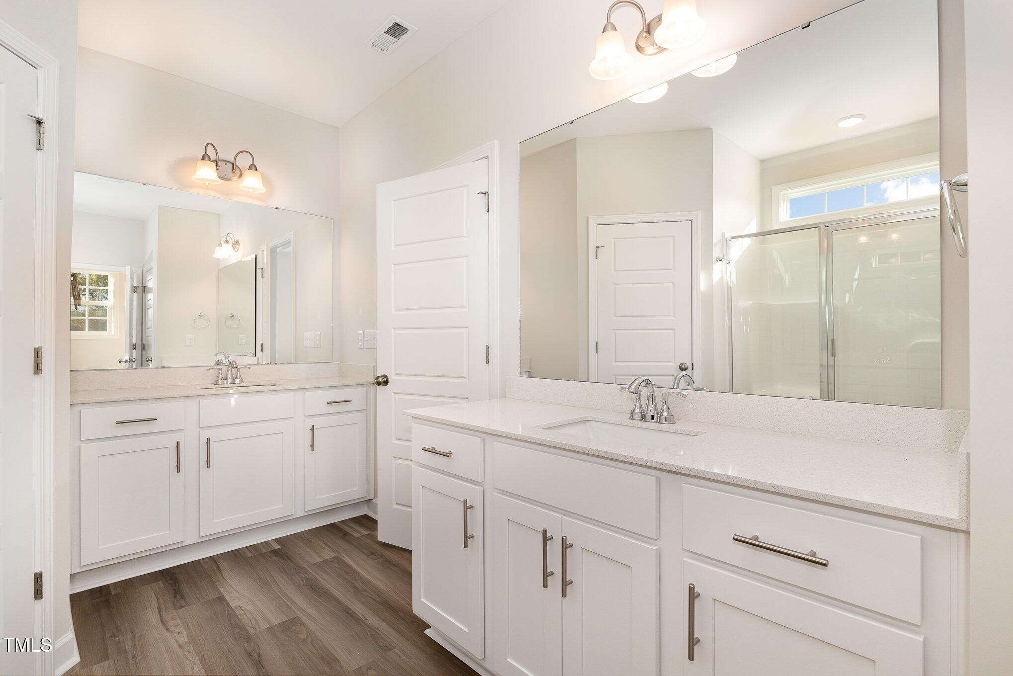 15 Barony Lane Smithfield, NC 27577 - Photo 17 of 24 a spacious bathroom with a granite countertop sink mirror and a