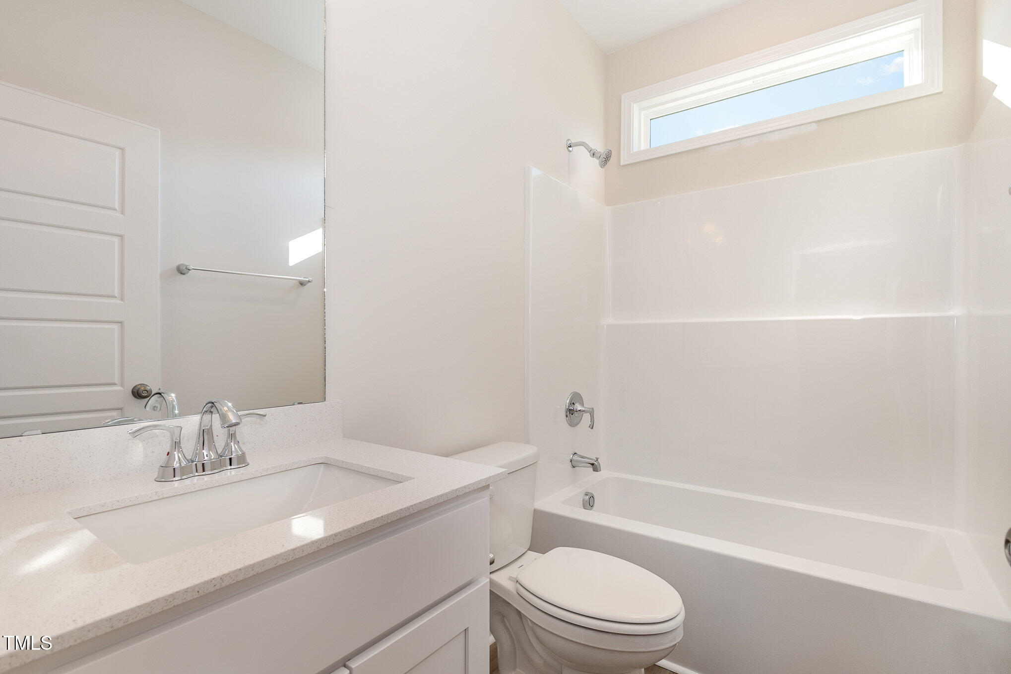 15 Barony Lane Smithfield, NC 27577 - Photo 19 of 24 a bathroom with a granite countertop sink a toilet and shower