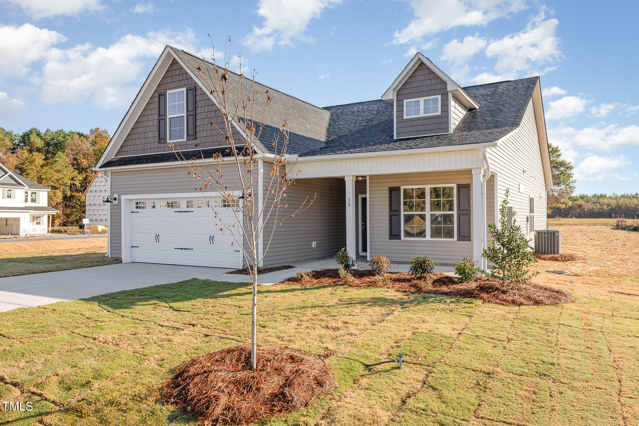 15 Barony Lane Smithfield, NC 27577 - Photo 2 of 24 a front view of a house with a yard