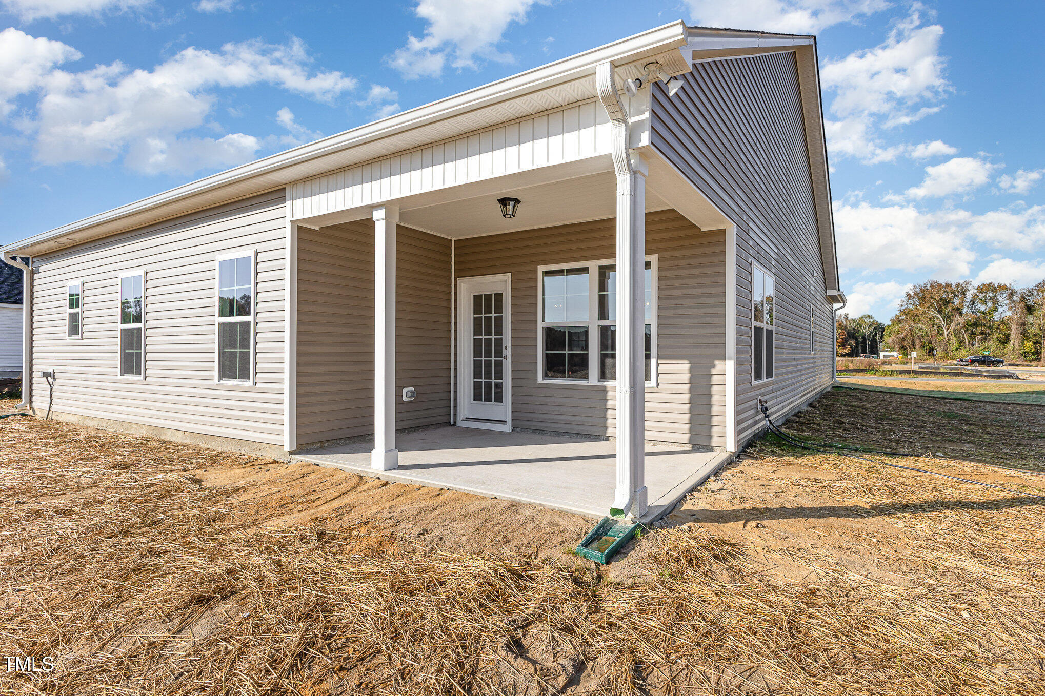 15 Barony Lane Smithfield, NC 27577 - Photo 22 of 24 a front view of a house with a garage