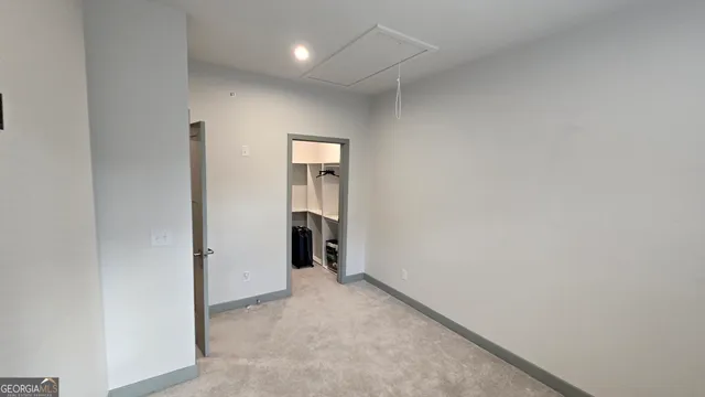 a white toilet and shower curtain