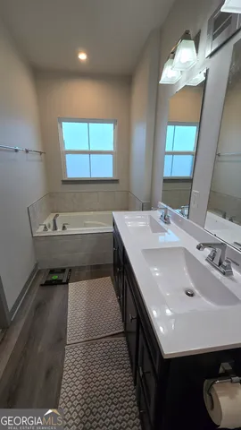 a bathroom with a sink and a shower