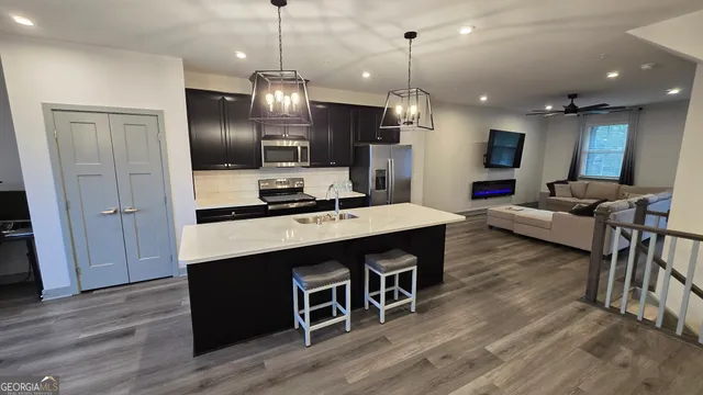 a view of a wooden balcony with outdoor space