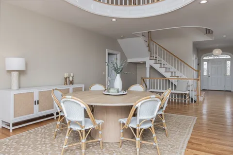 a bedroom with a bed and a table