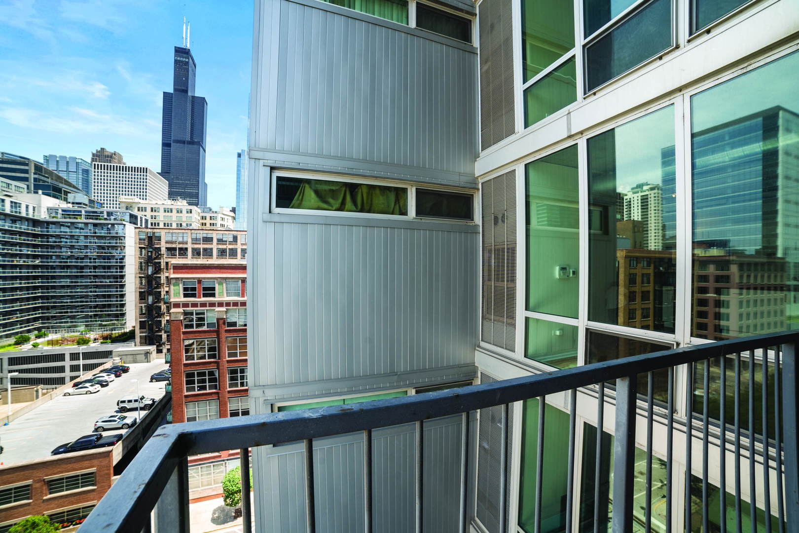 700 West Van Buren Street, Unit 1010 Chicago, IL 60607 - Photo 11 of 12 a view of a balcony with an outdoor space