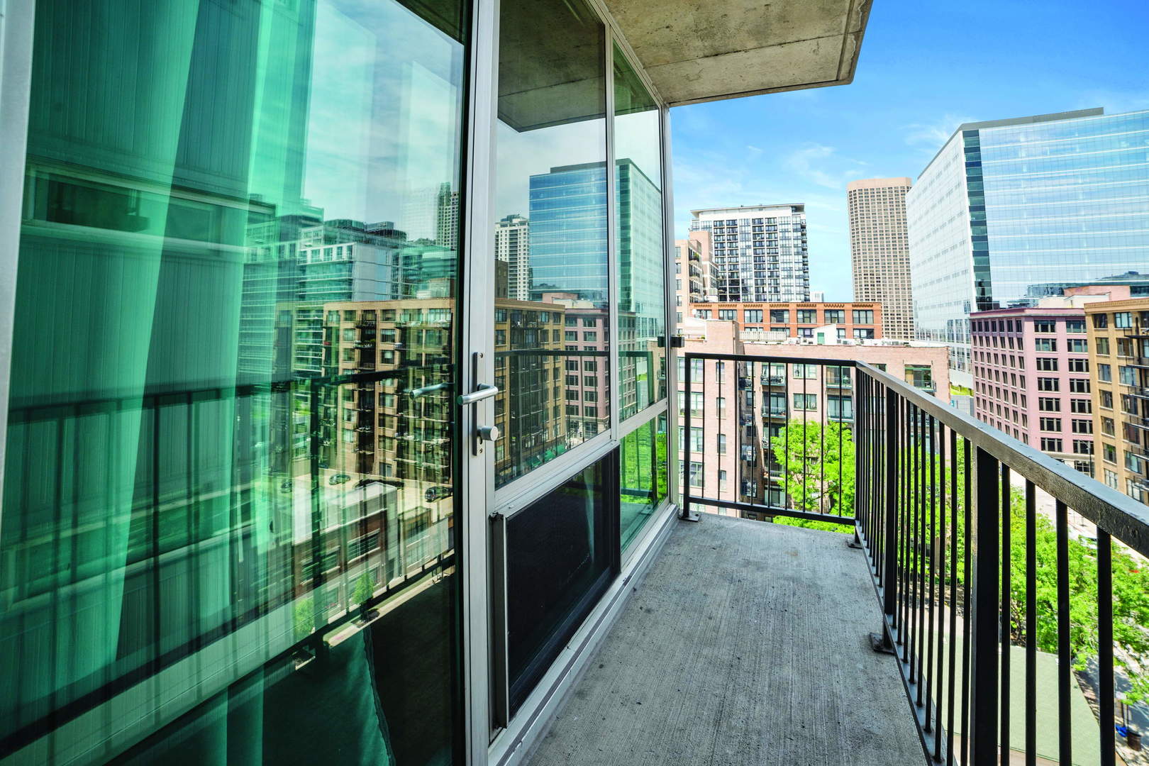 700 West Van Buren Street, Unit 1010 Chicago, IL 60607 - Photo 10 of 12 a city view from a balcony