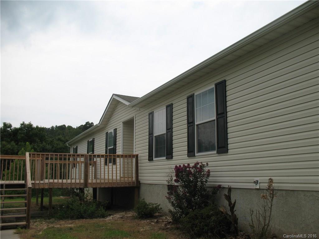 1890 Redmon Road Marshall, NC 28753 - Photo 3 of 16 a house view with a garden