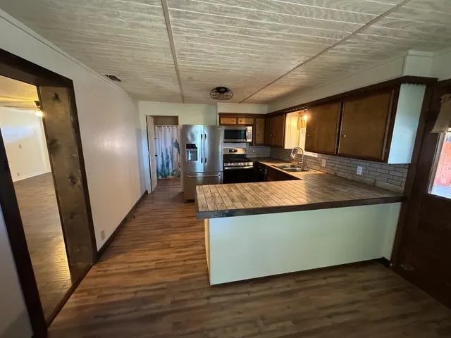 a view of a refrigerator in a house