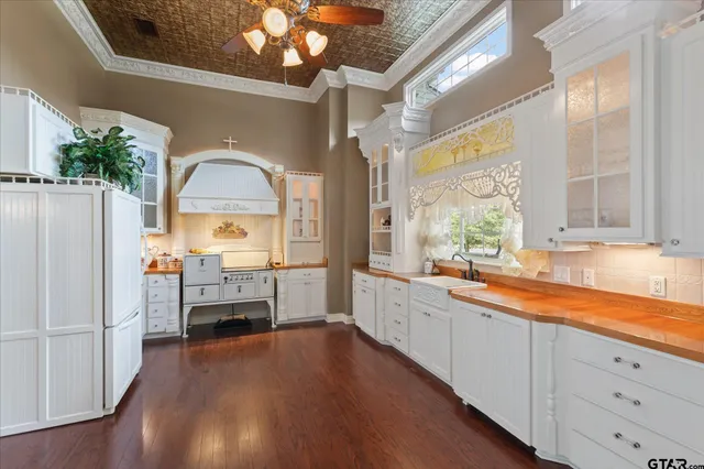 a view of an entryway with wooden floor and a window